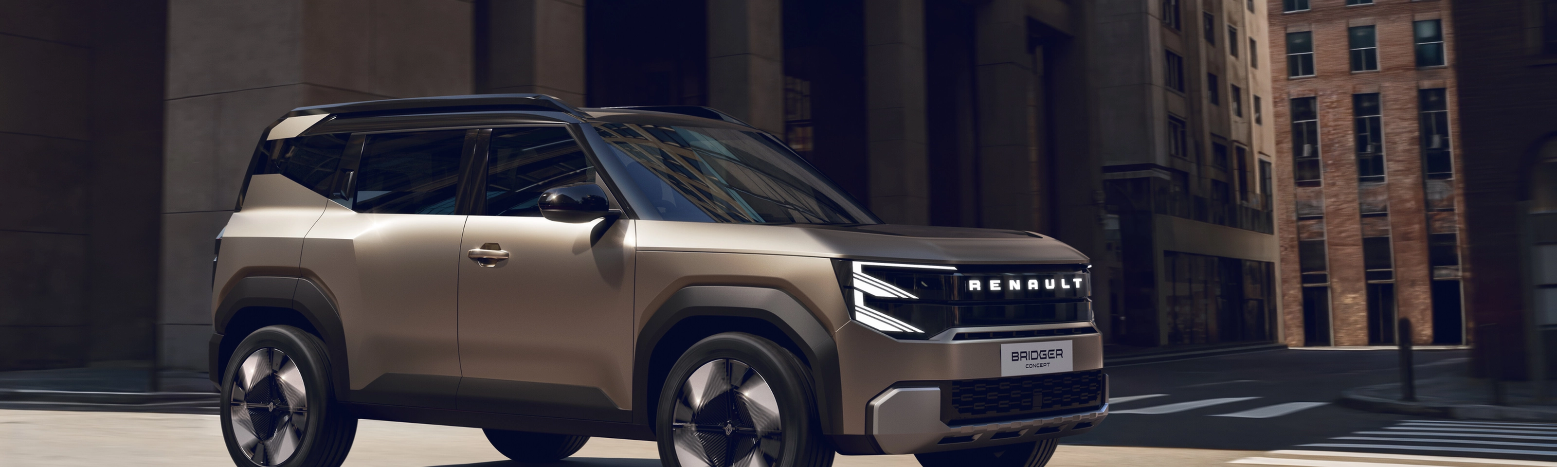 Renault Bridger Concept SUV driving through a modern city street.