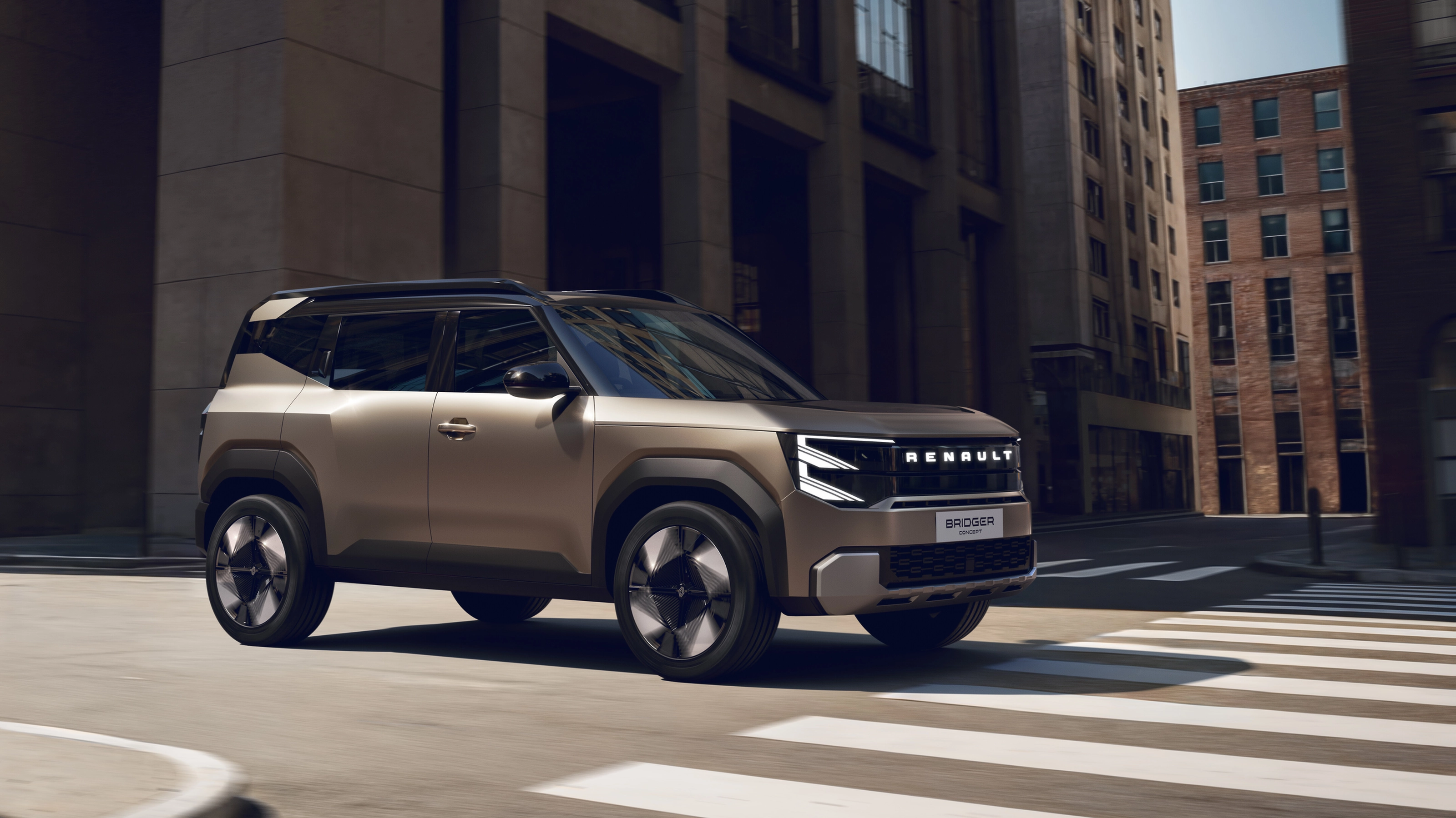 Renault Bridger Concept SUV driving through a modern city street.