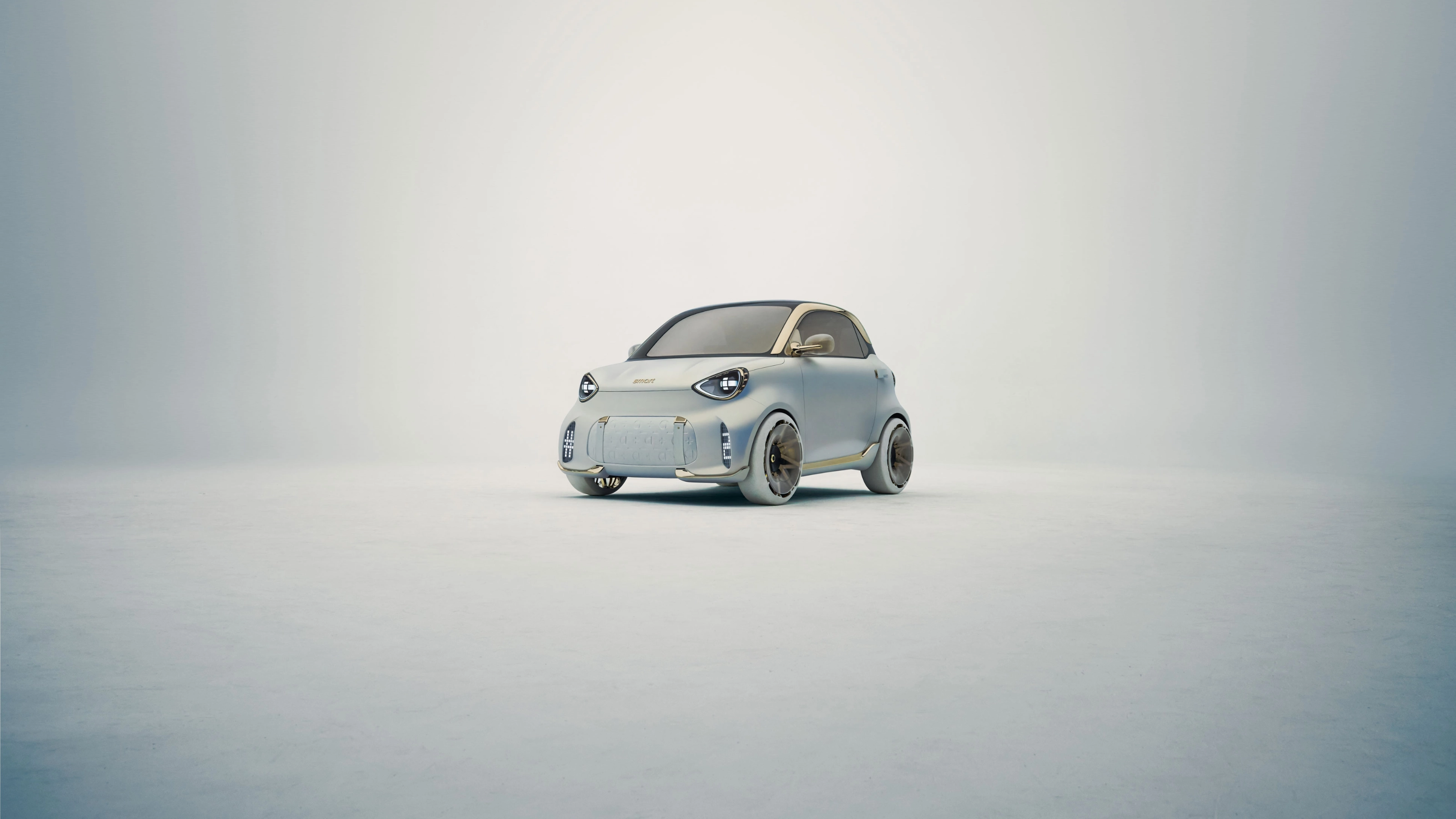 Small white compact car parked on a vast empty surface.