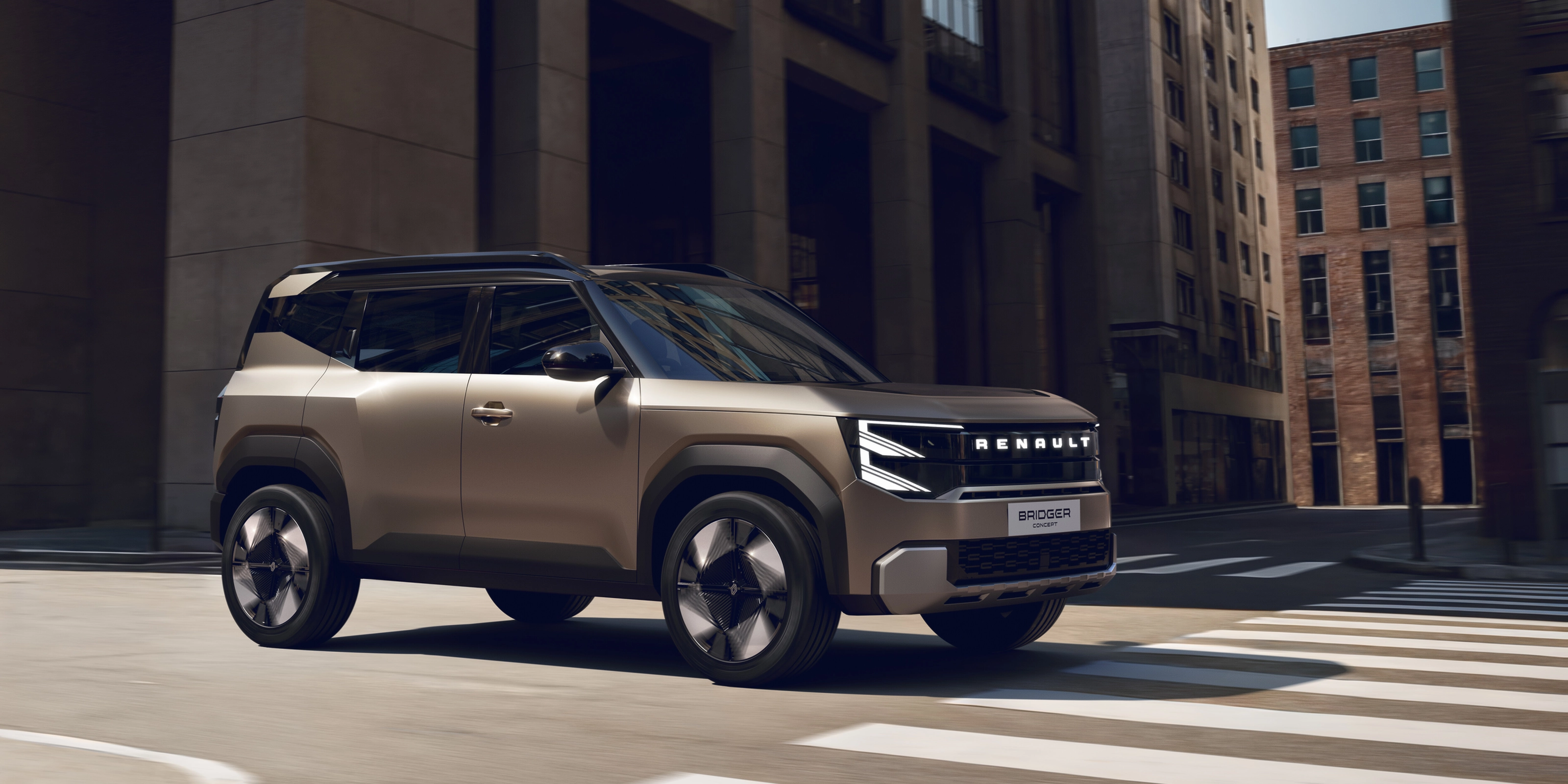 Renault Bridger Concept SUV driving through a modern city street.