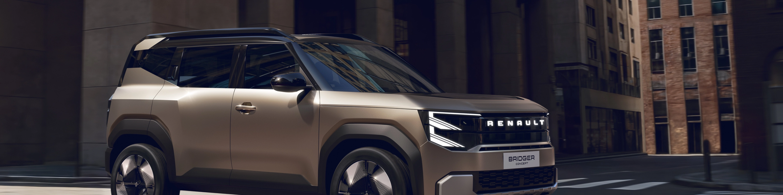 Renault Bridger Concept SUV driving through a modern city street.