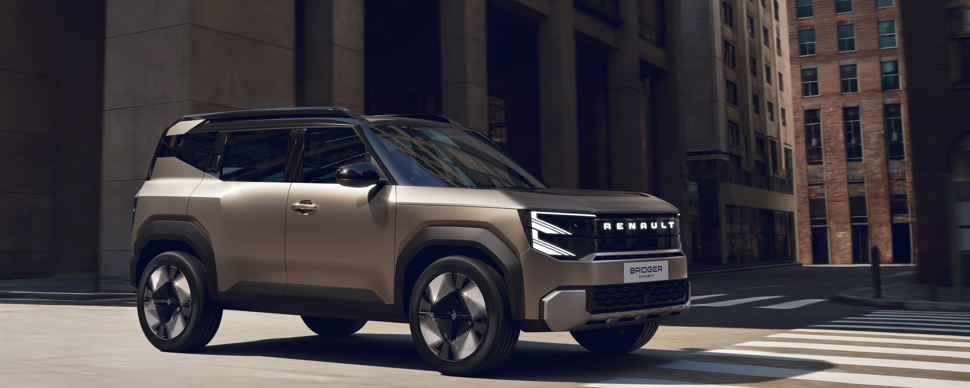 Renault Bridger Concept SUV driving through a modern city street.