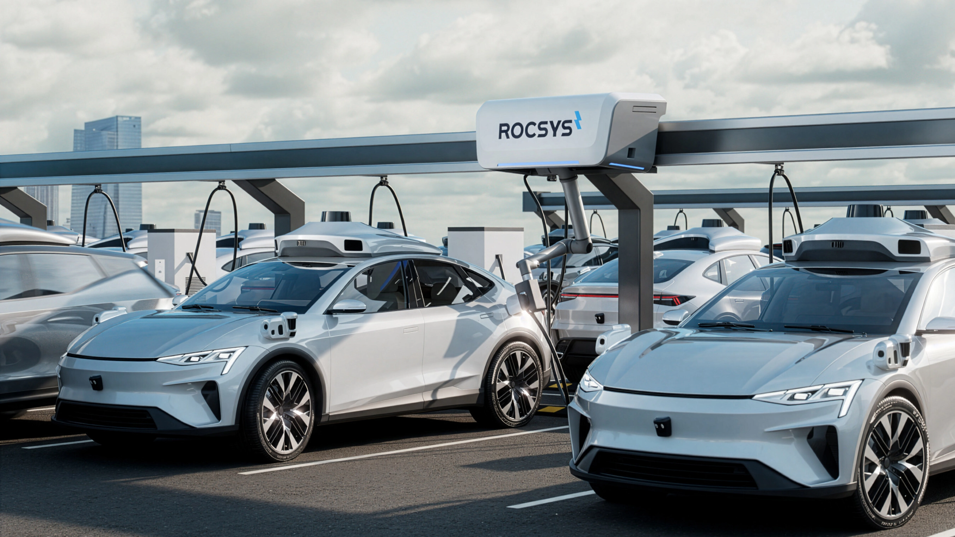 Electric cars charging automatically at a Rocsys robotic station.