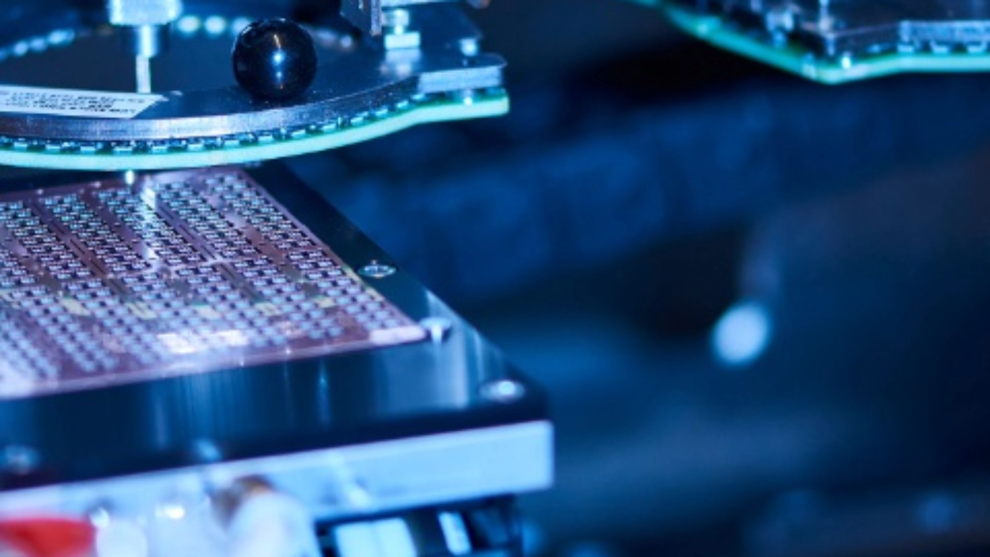 Automated semiconductor production equipment in a manufacturing facility.