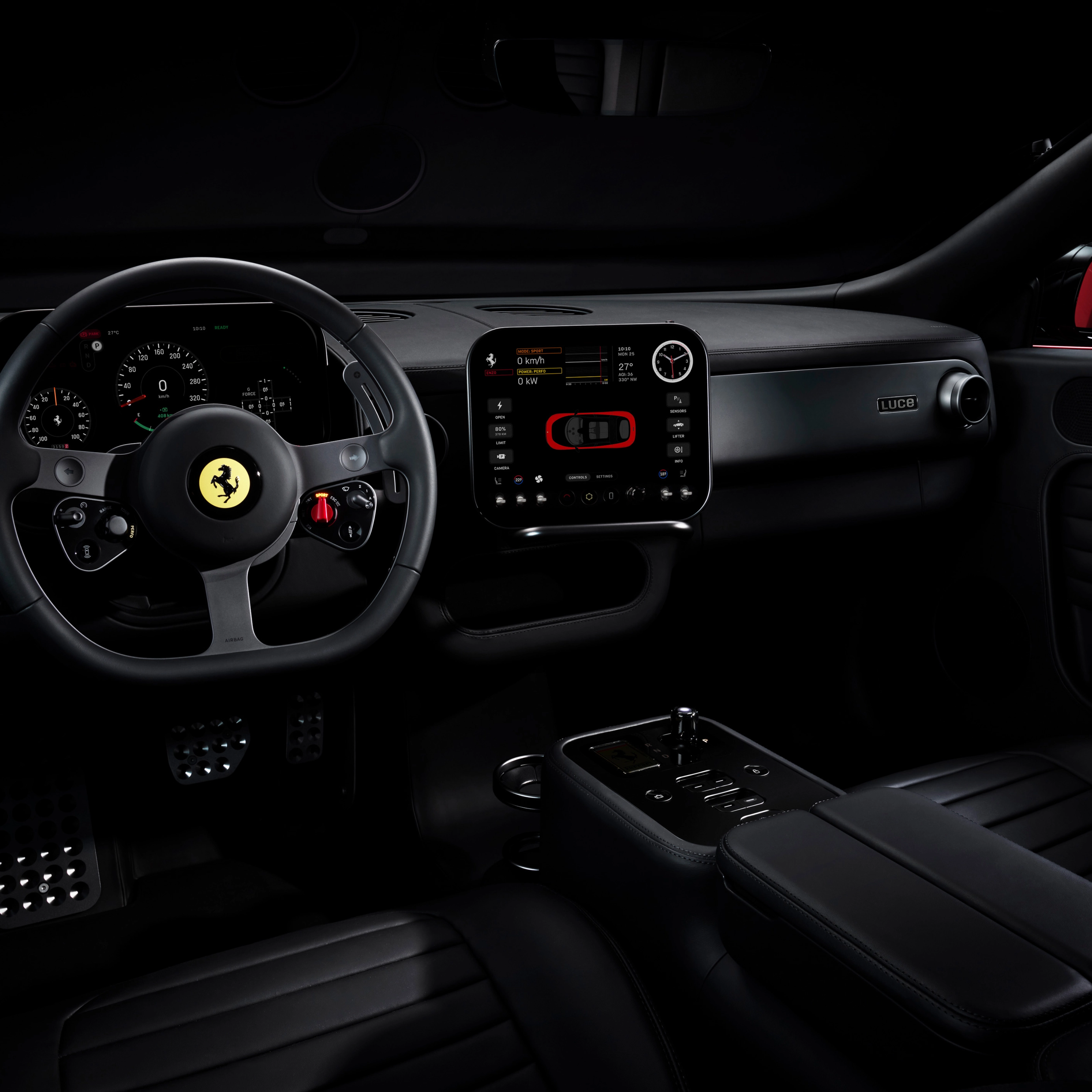 Dark Ferrari interior with illuminated dashboard and steering wheel.