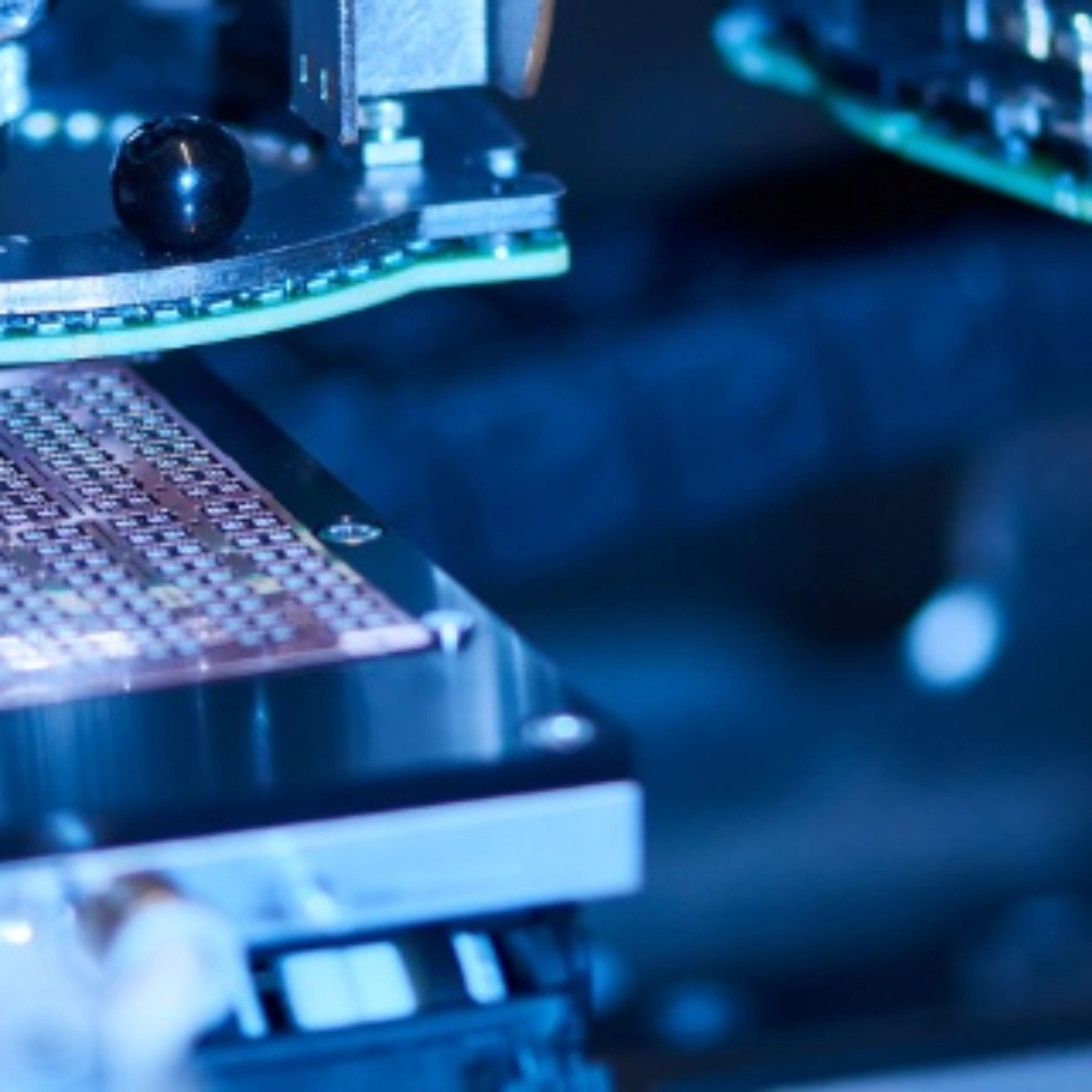 Automated semiconductor production equipment in a manufacturing facility.