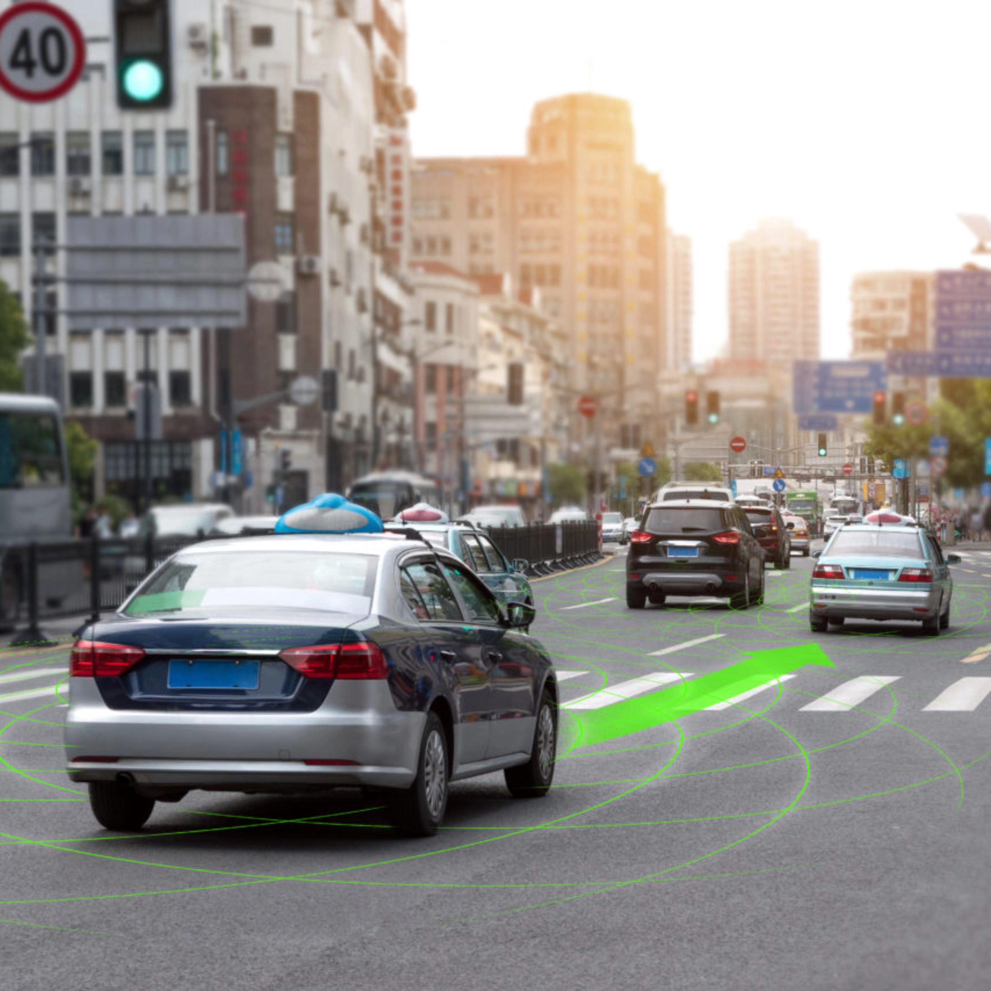 Car driving through a city street with lane guidance highlighted by driver assistance.