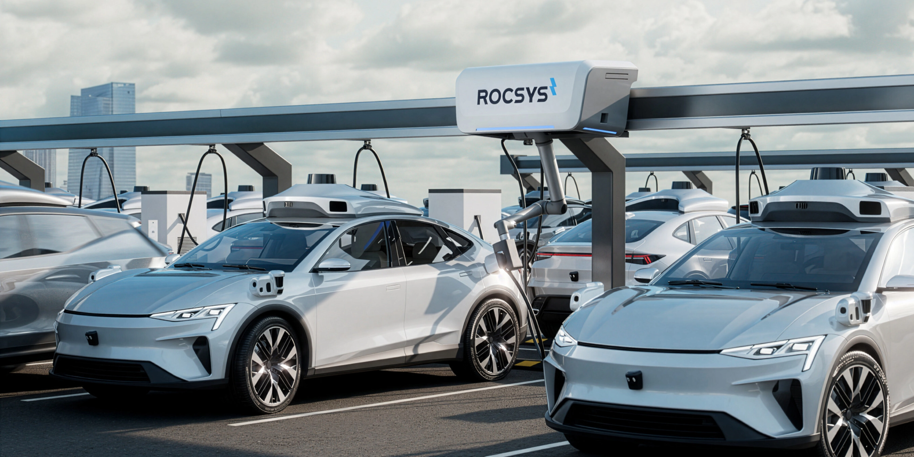 Electric cars charging automatically at a Rocsys robotic station.