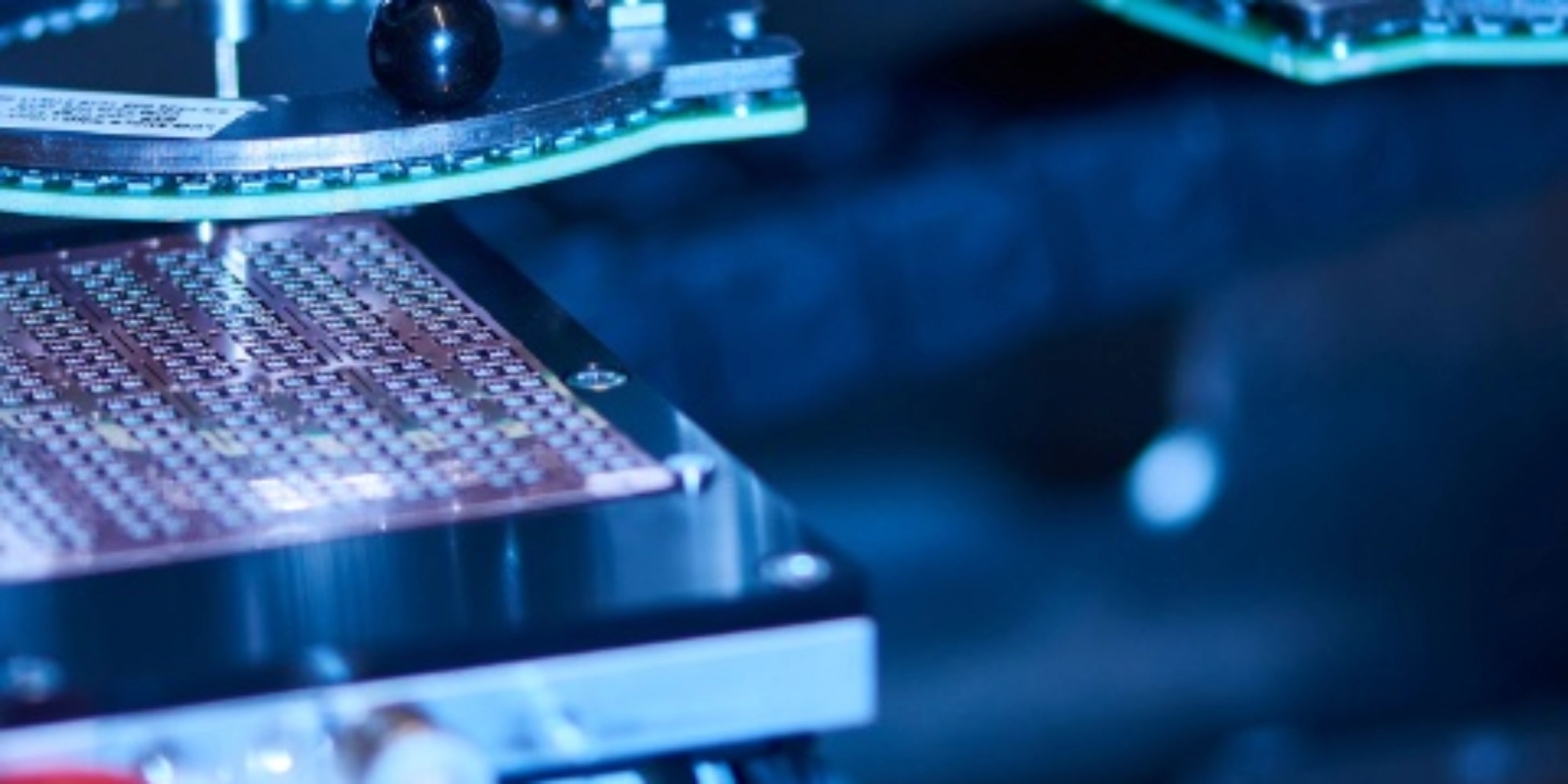 Automated semiconductor production equipment in a manufacturing facility.