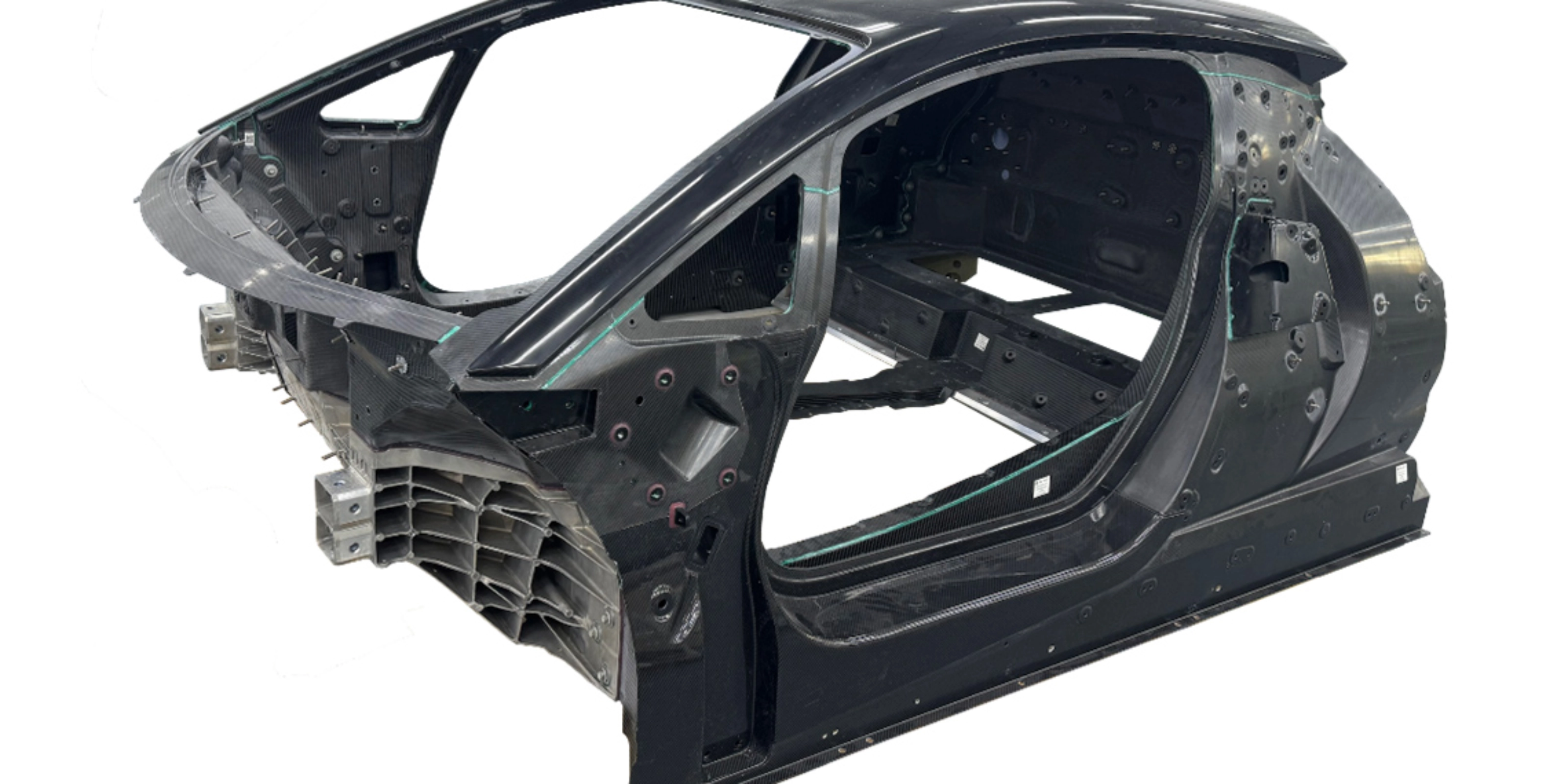 Carbon car monocoque chassis without exterior panels or interior components.
