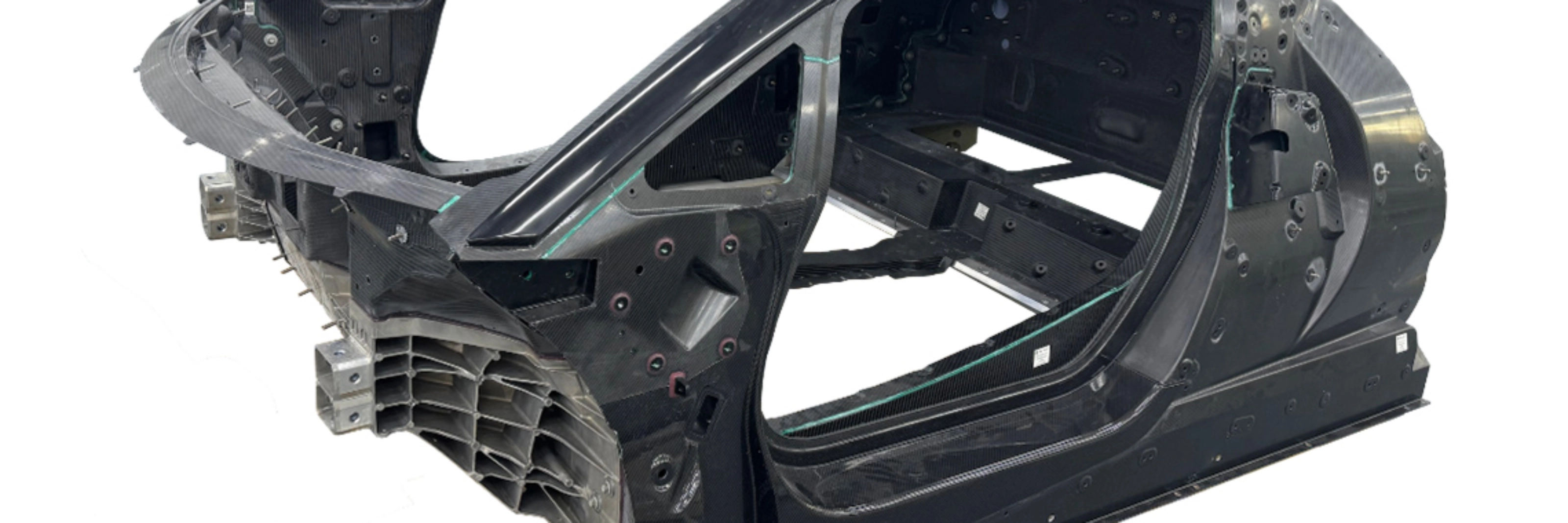 Carbon car monocoque chassis without exterior panels or interior components.