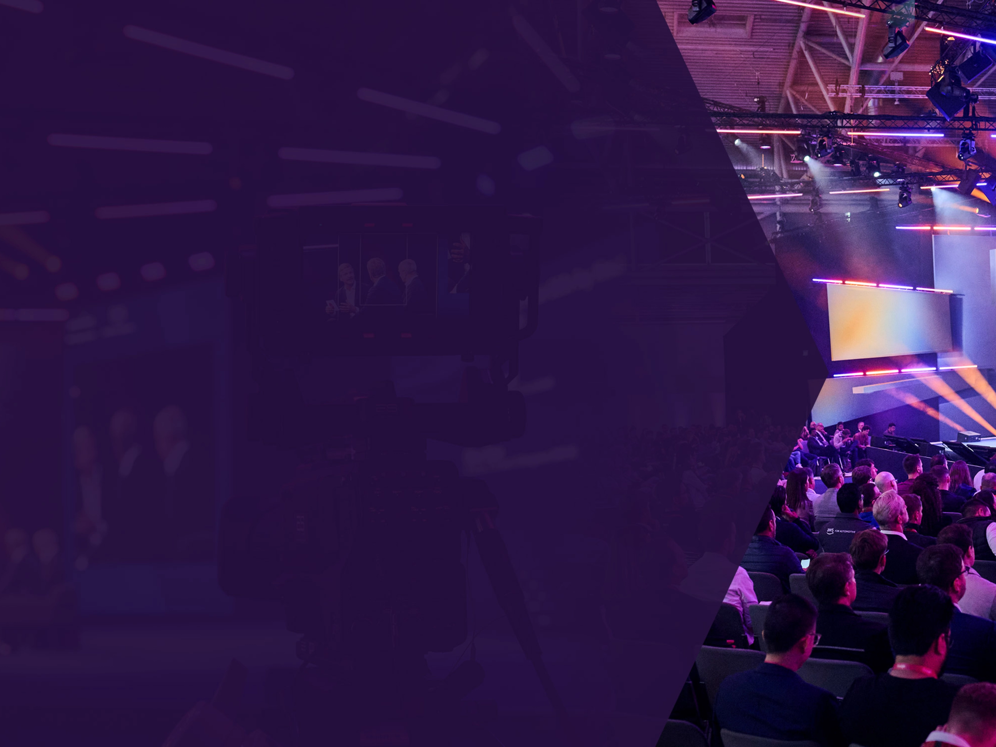 Speaker on stage at a tech conference with a large seated audience and colorful lighting.