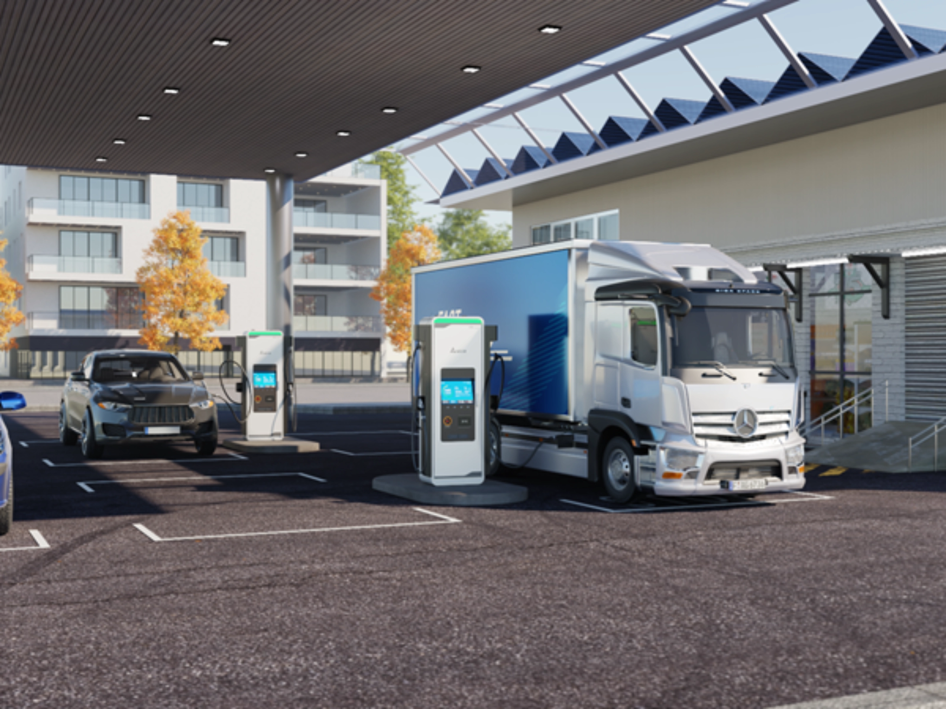 Electric cars and a truck charge at a covered EV charging station near a modern building.