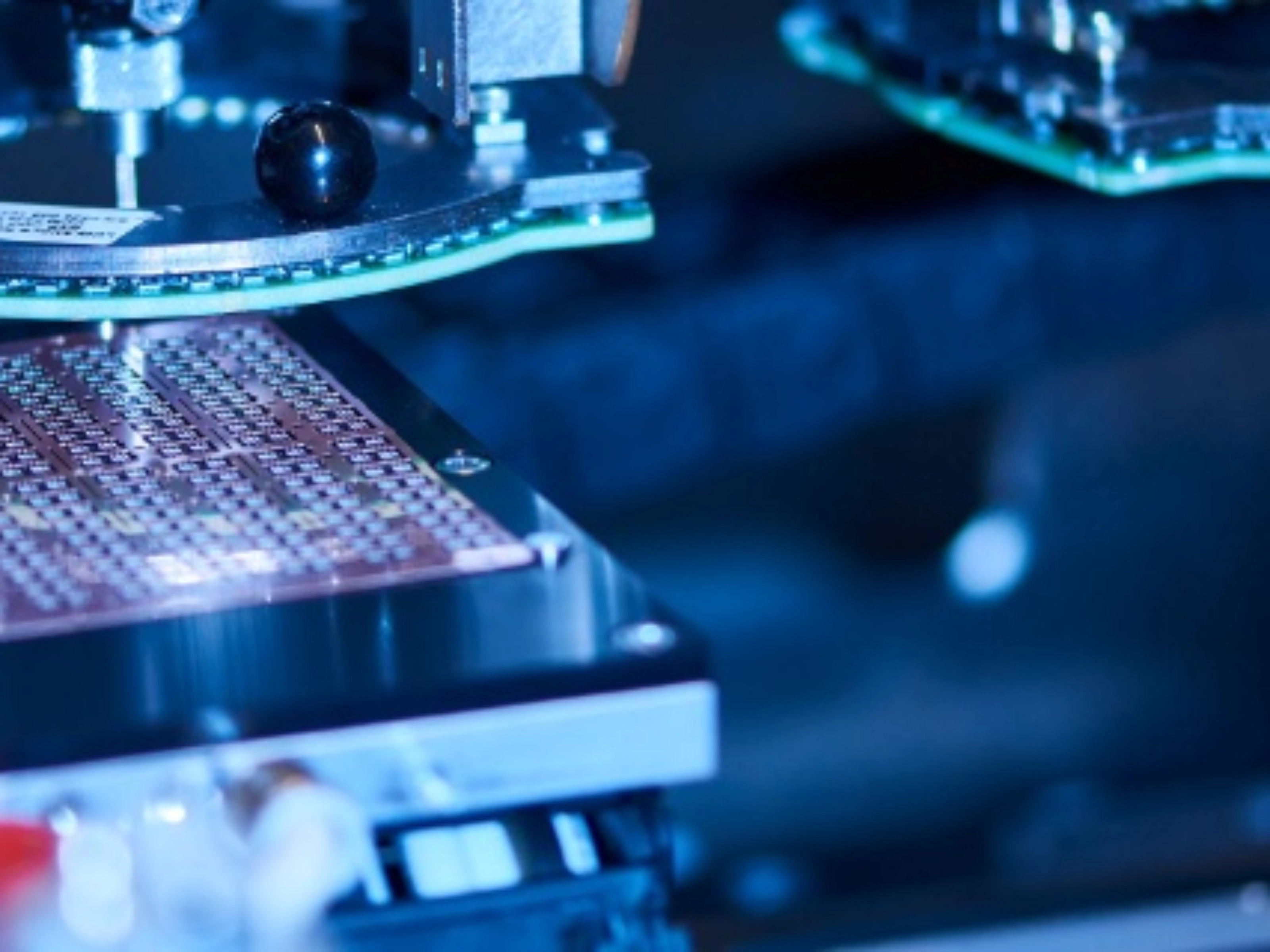 Automated semiconductor production equipment in a manufacturing facility.