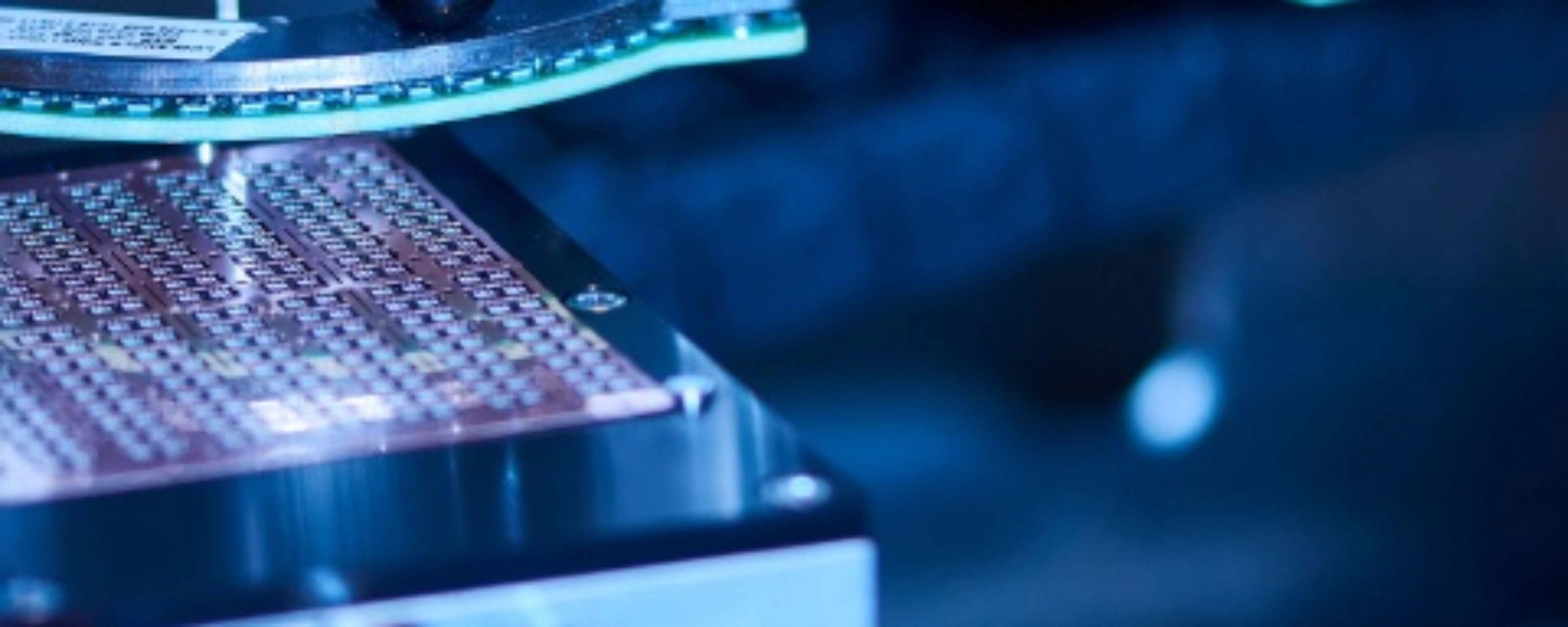 Automated semiconductor production equipment in a manufacturing facility.