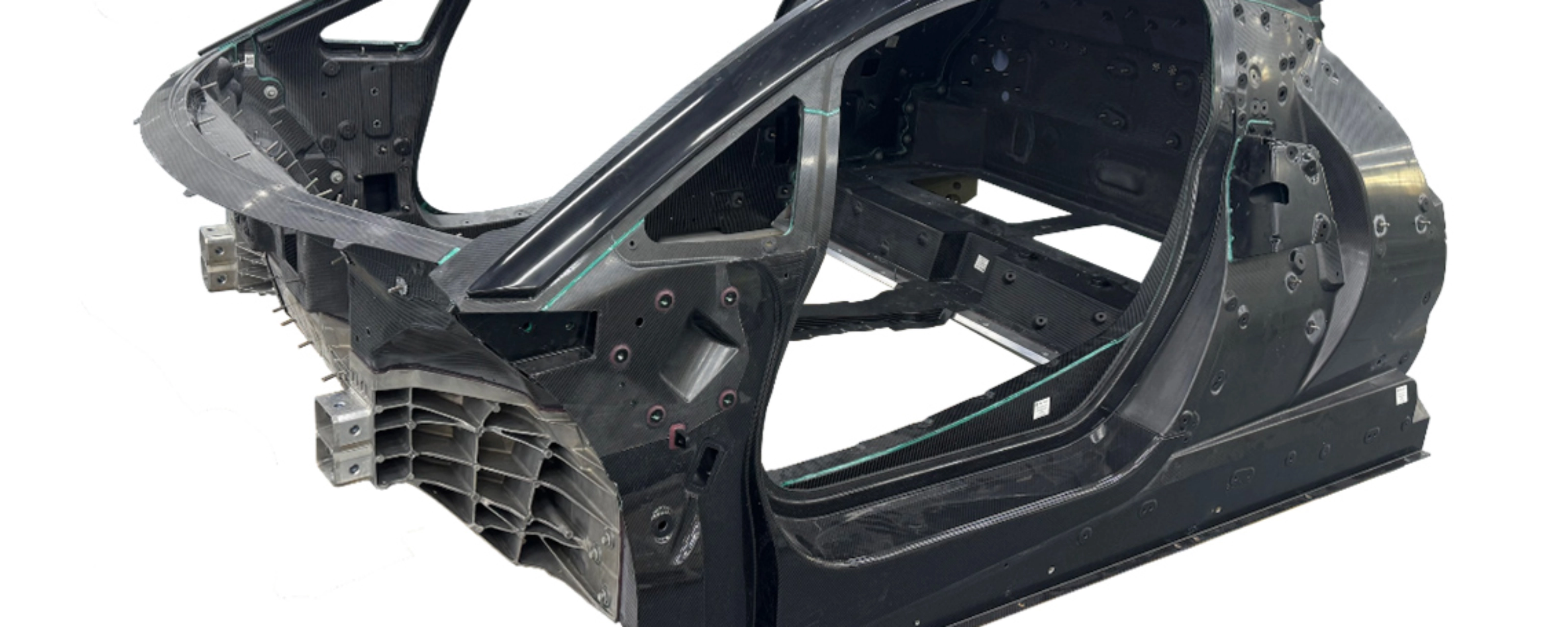 Carbon car monocoque chassis without exterior panels or interior components.