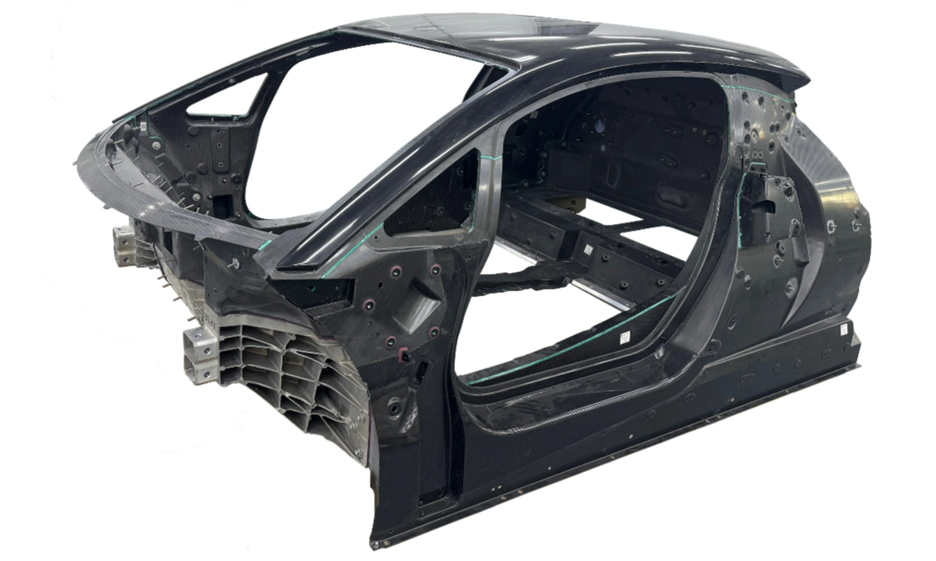 Carbon car monocoque chassis without exterior panels or interior components.