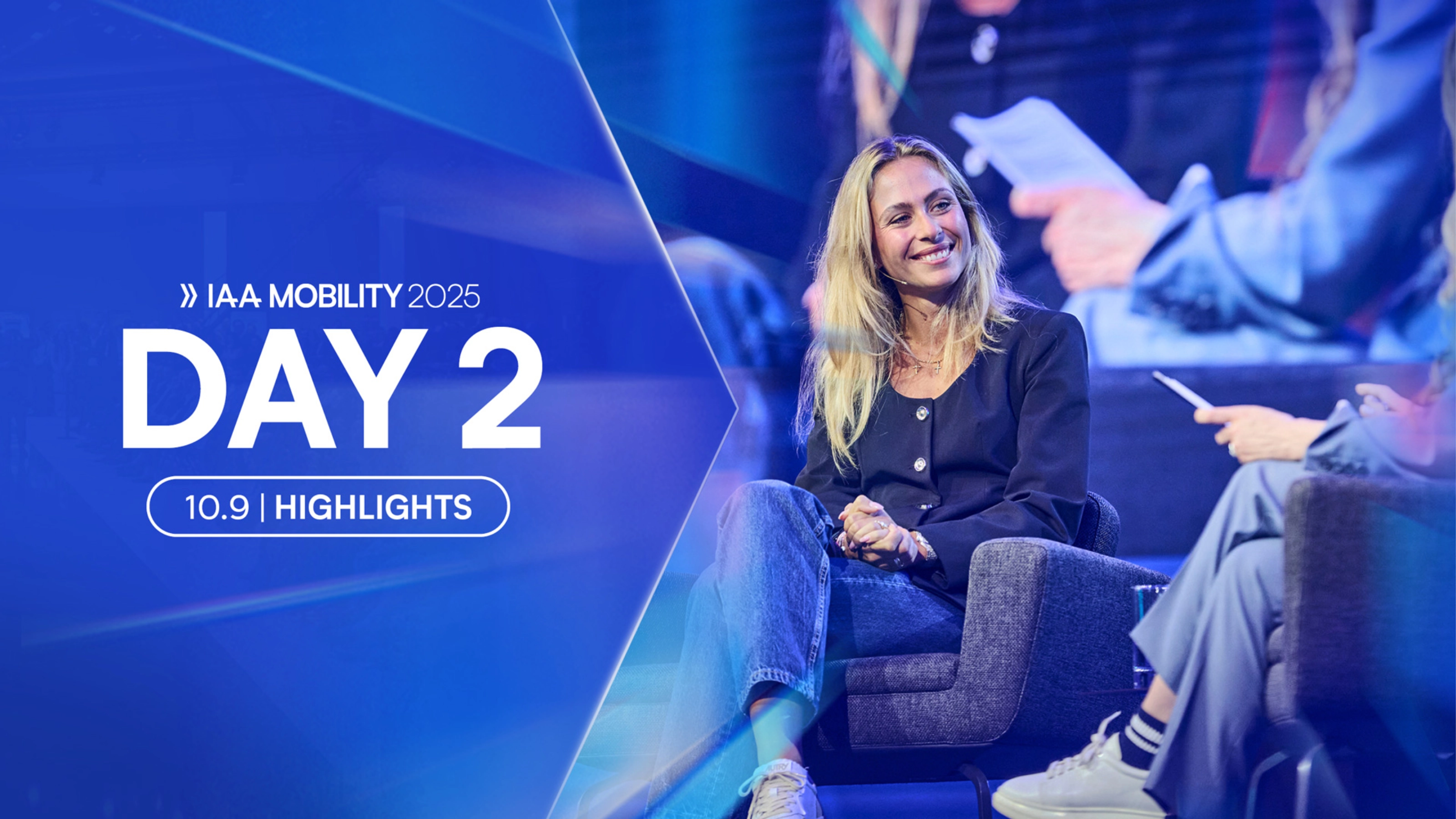 Sophia Flörsch smiles during a panel talk at Day 2 of the IAA MOBILITY 2025 event.