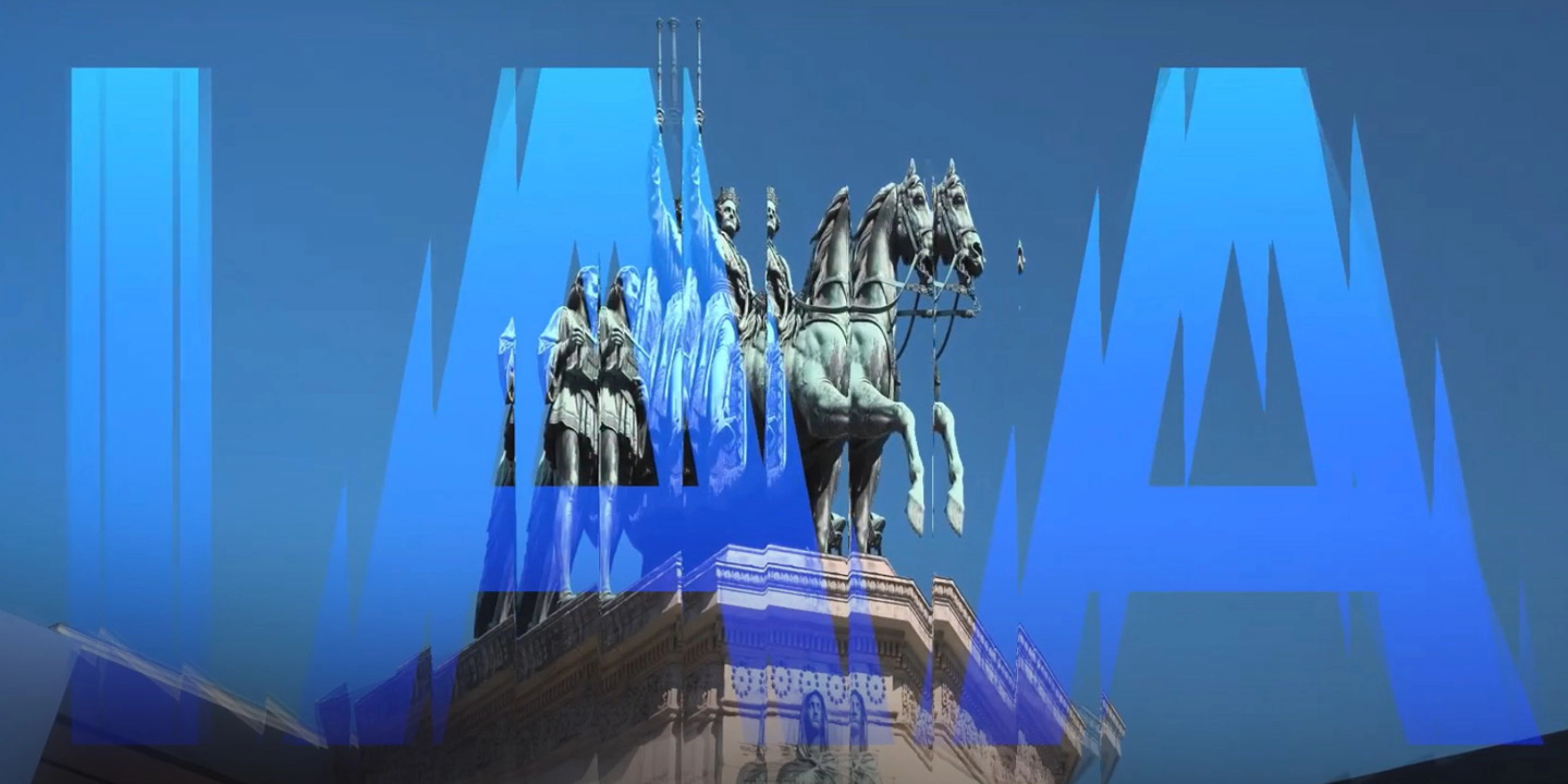 Thumbnail image of the IAA Munich auto show: Monument with equestrian statues overlaid by large blue letters spelling "IAA" on a clear sky.
