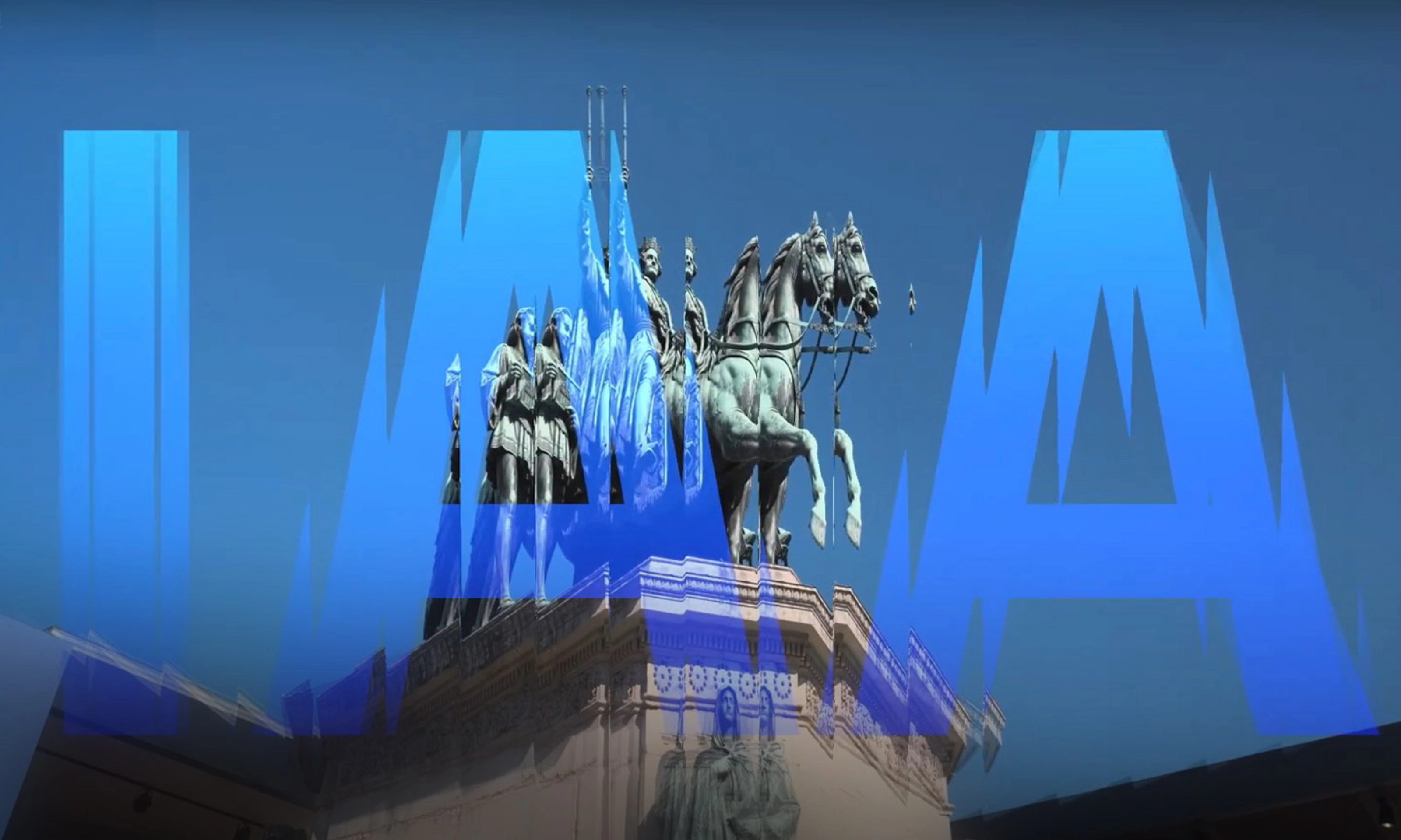 Thumbnail image of the IAA Munich auto show: Monument with equestrian statues overlaid by large blue letters spelling "IAA" on a clear sky.