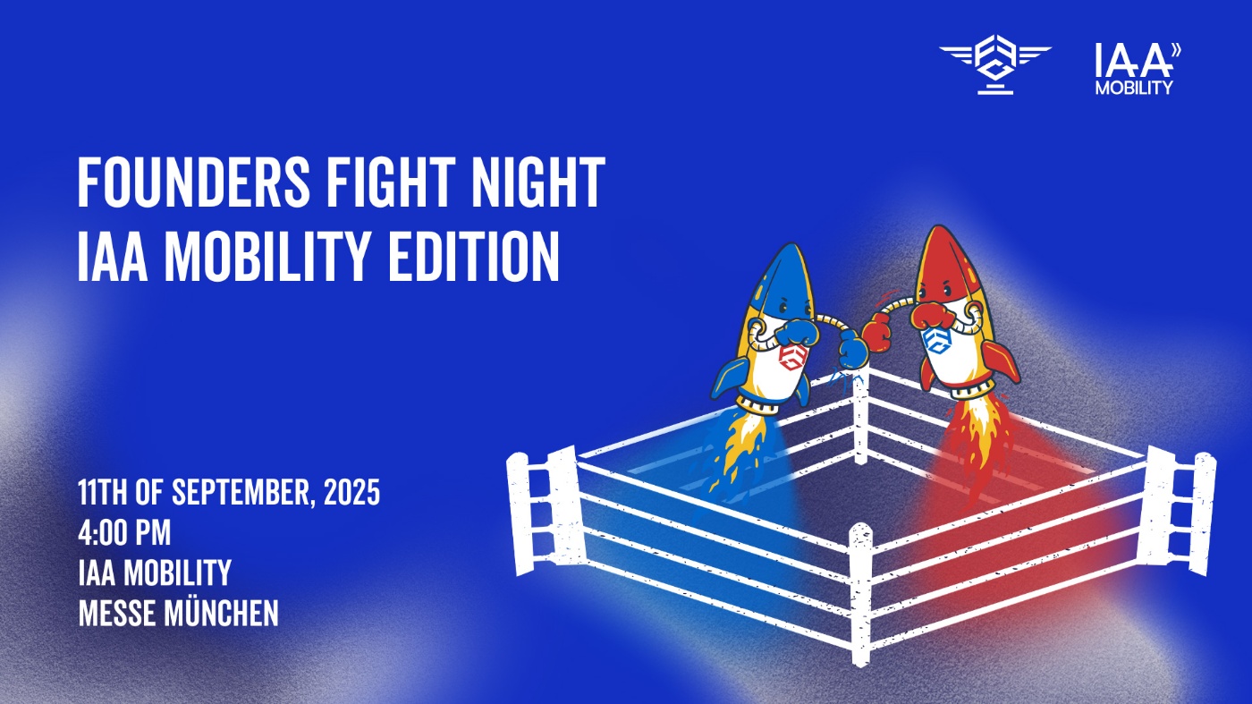 Two cartoon rockets with boxing gloves face off in a ring at the IAA Mobility 2025 event.