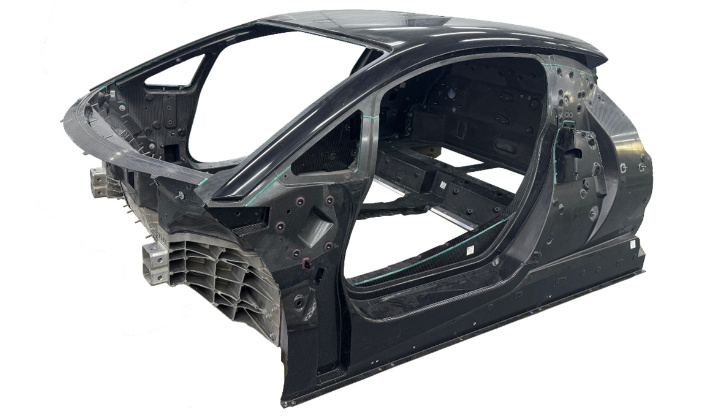 Carbon car monocoque chassis without exterior panels or interior components.