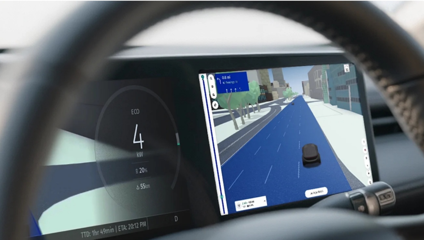 Car dashboard screen showing 3D navigation map and energy consumption data while driving.