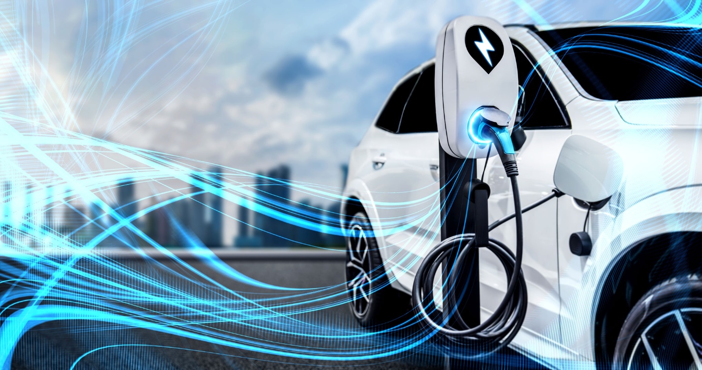 An electric car is being charged at a station with dynamic blue energy lines around it.