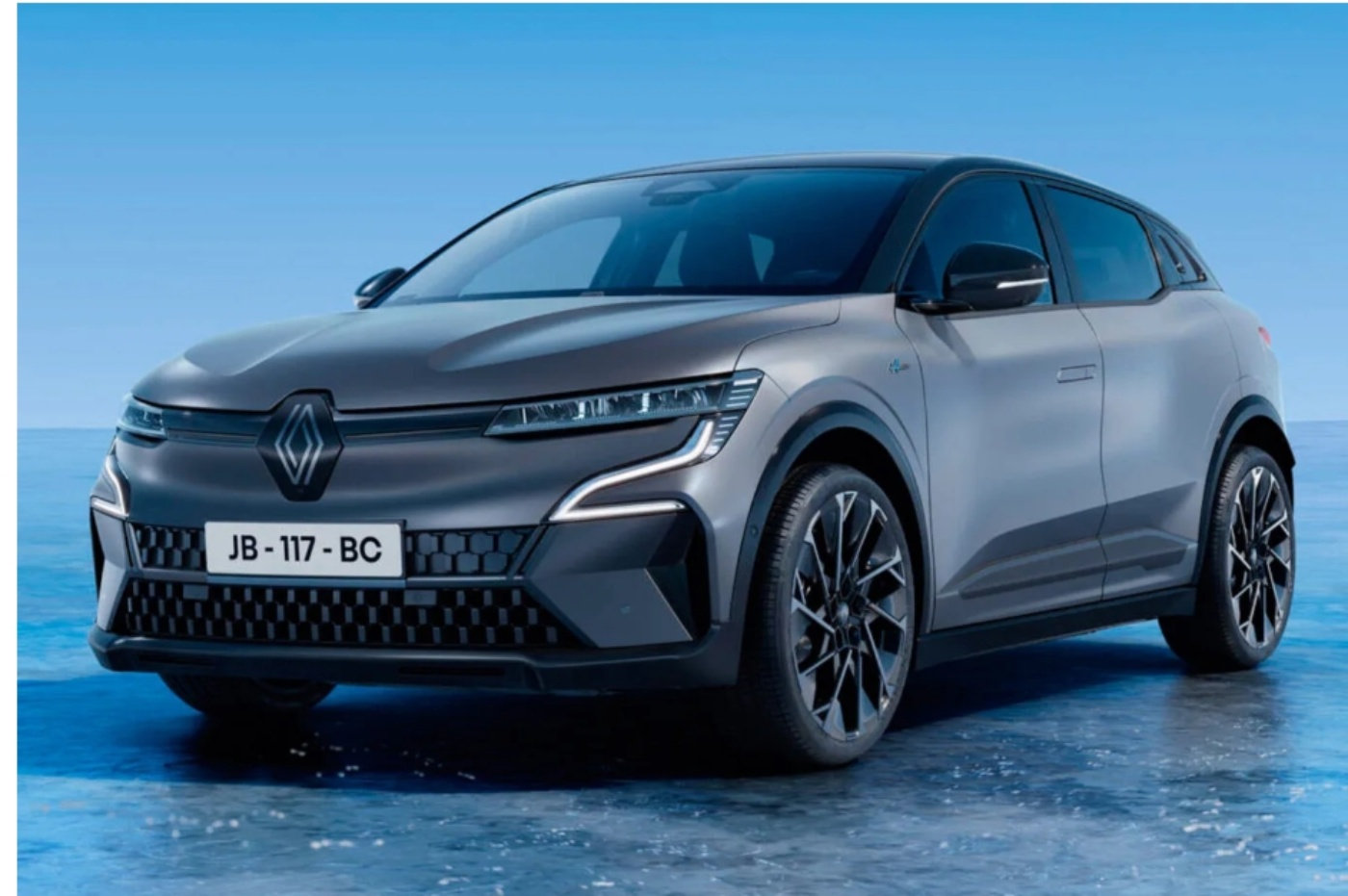 Modern electric SUV from Renault, shown in a studio-like setting with a blue background.