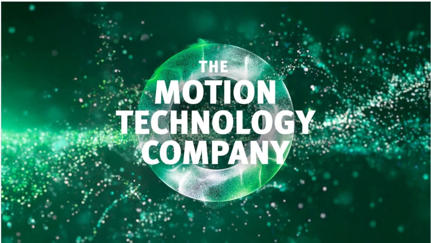White text "The Motion Technology Company" on a green digital background with light particles.