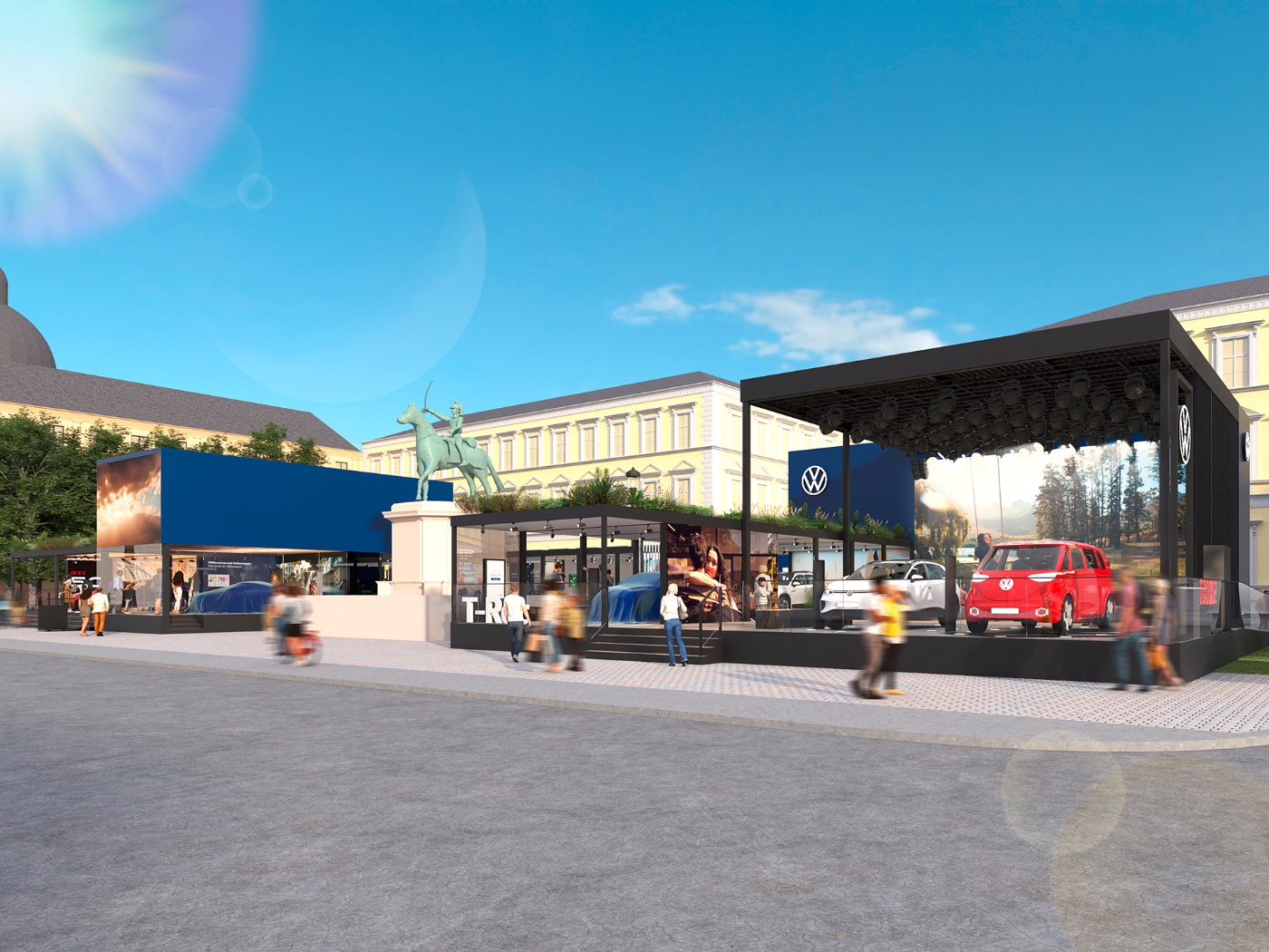 Volkswagen-Ausstellung im Freien mit Fahrzeugen und Ständen auf einem Stadtplatz bei klarem Himmel.