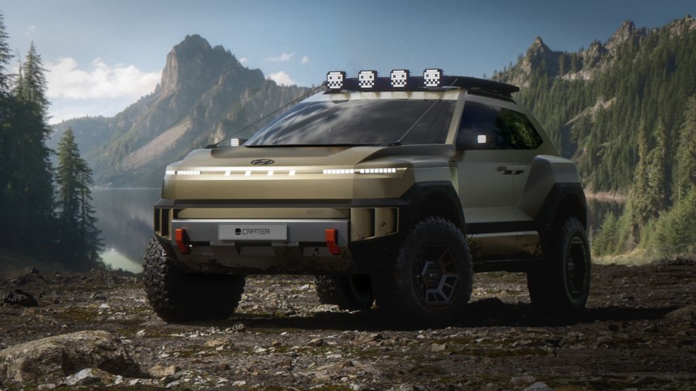 Futuristic off-road concept SUV from Hyundai parked in a rugged mountain landscape.
