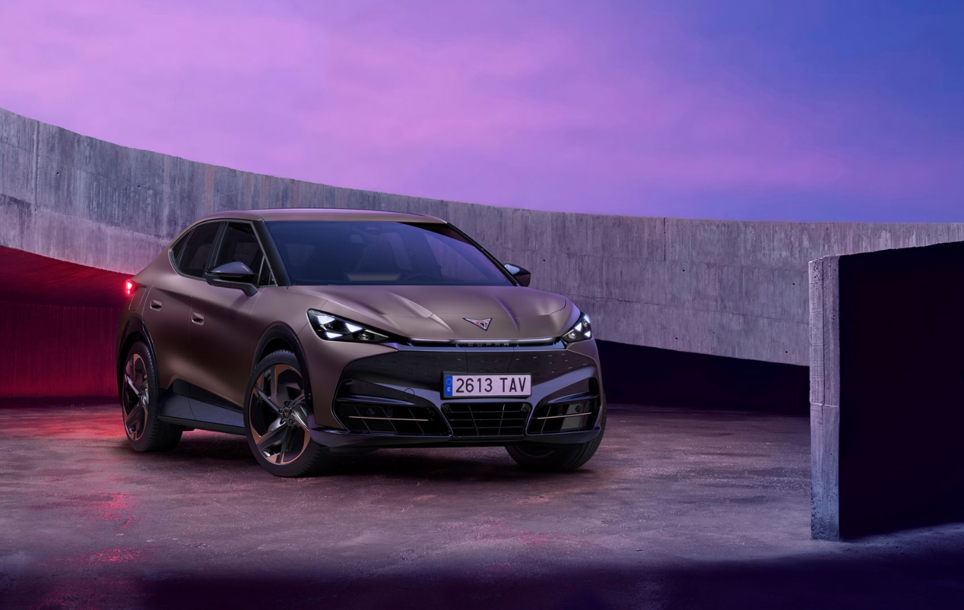 Cupra car parked in modern concrete setting with purple lighting.