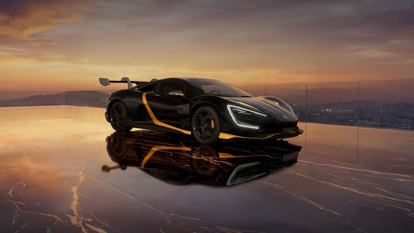 YANGWANG U9 Xtreme with rear wing parked on rooftop terrace at sunset.