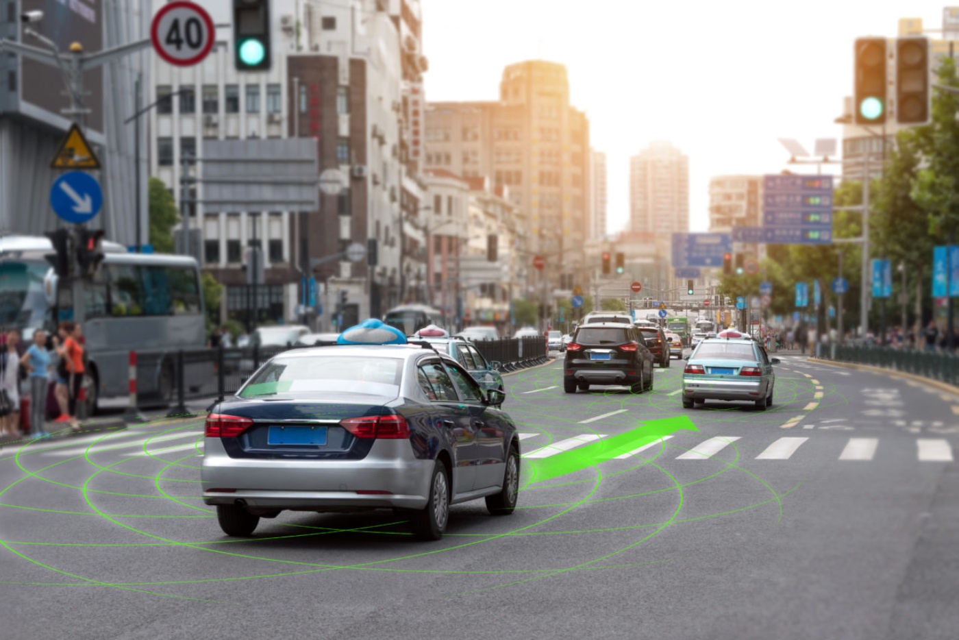 Car driving through a city street with lane guidance highlighted by driver assistance.