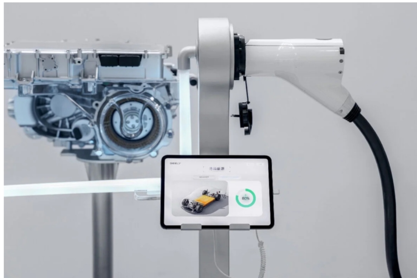 Geely charging system with a charging plug, electric drive unit and display.